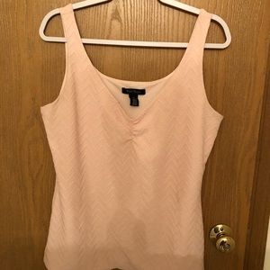 Size XL White House Black Market tank top in a very pretty light pink.